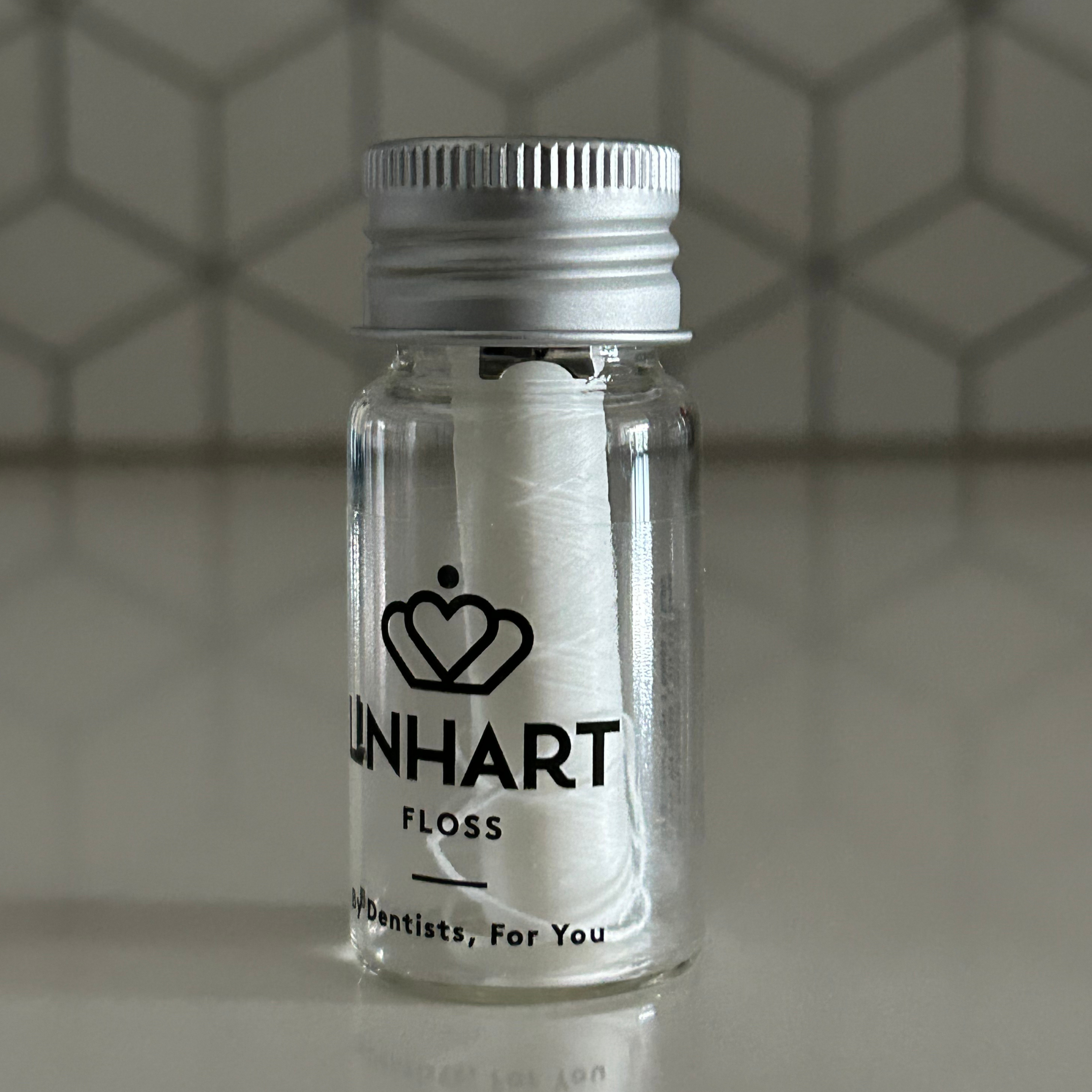 Dental Floss in Glass Bottle